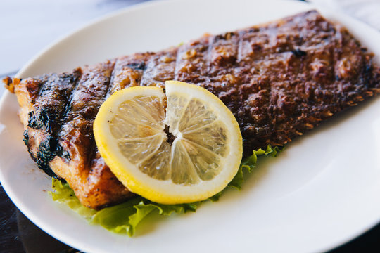 Catfish Steak Cooking On The Grill