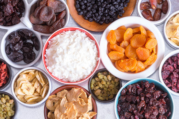 Assortment of dried fruit in individual dishes