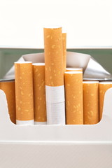 Cigarettes with a brown filter close - up
