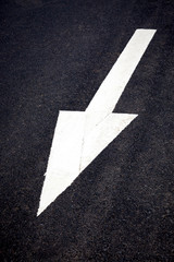 Fototapeta premium White forward traffic arrow on road