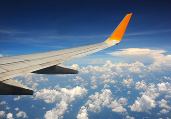 Obraz premium View of jet plane wing