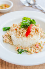 Spicy fried chicken with basil and rice