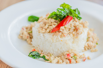 Spicy fried chicken with basil and rice
