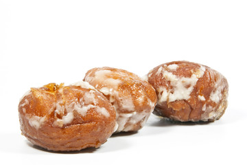 Three Tasty Mini-donuts Covered in Sweet Icing