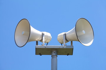 Outside loudspeaker against nice blue sky