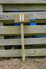 Wooden sign giving garden plot number