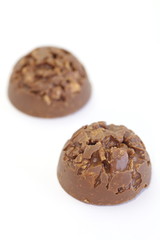 Sweet appetizer chocolate cookies on a white background