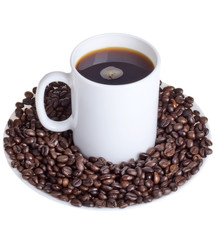 Coffee beans with a cup of coffee