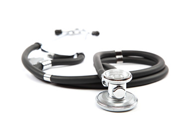 Medical stethoscope on a white background.