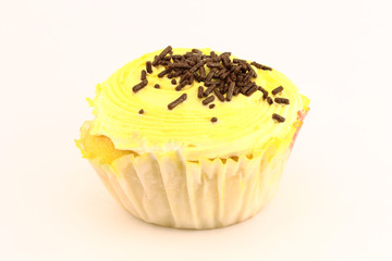 Muffin decorated with chocolate pearls