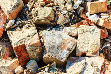 Construction site. Closeup stack of old bricks.