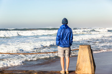 Teenager  Watching Large Waves Power