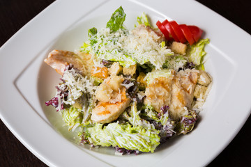 Salad in a white plate
