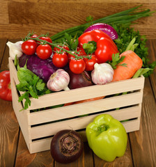 Various vegetables in a wooden box