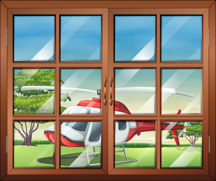 A closed window with a view of the chopper outside