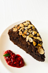Chocolate cake decorated with almonds