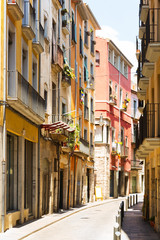 narrow street of european city.  Girona