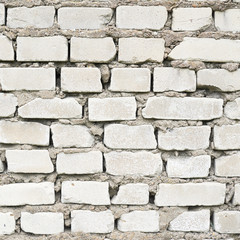 Old white brick wall fragment