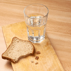 Glass of water and bread