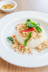 Spicy fried chicken with basil and rice