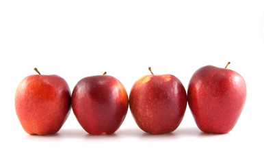 Four red apples