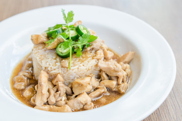 Chicken with brown sauce on rice