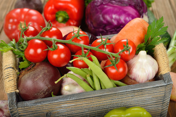 Various vegetables in a wooden box