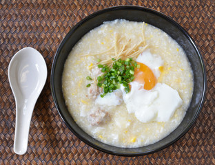 Thai style breakfast with pork and soft-boiled egg