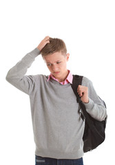 Sad teenage boy with a backpack