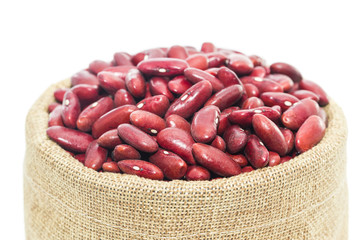 Kidney  beans in wood cup on white background