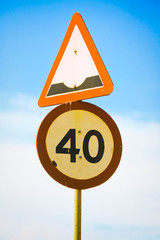 Bump ahead road sign,Maximum speed 40 km