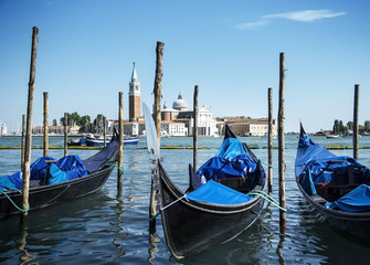 Fototapeta na wymiar Gondolas on Grand Canal in Venice