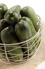 freshly picked gherkin in a basket