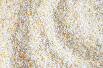 Background of the raw yellow rice grains