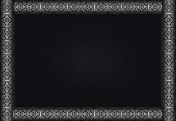 Frame with silver metal ornament .