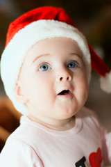 Portrait of a baby in Christmas hat