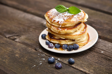Delicious pancakes with blueberry and mint