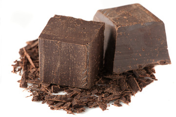 Cubes of chocolate and grated chocolate