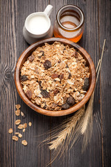 Muesli with milk and honey. Healthy breakfast