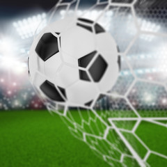 Fototapeta premium soccer ball in goal net
