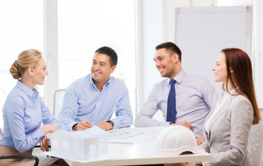 happy team of architects and designers in office