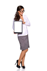 Young businesswoman holding clipboard