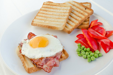 Fresh breakfest - ham, eggs, vegetable and toast