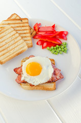 Fresh breakfest - ham, eggs, vegetable and toast