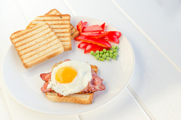 Fresh breakfest - ham, eggs, vegetable and toast