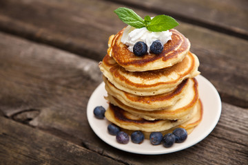 Delicious pancakes with blueberry and mint