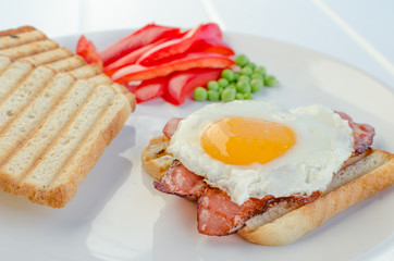 Fresh breakfest - ham, eggs, vegetable and toast