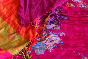 Colored textile with fringe
