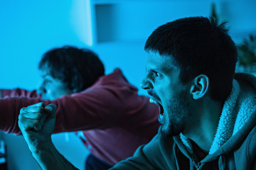 Friends watching sports on TV