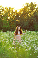 girl and field of flowers